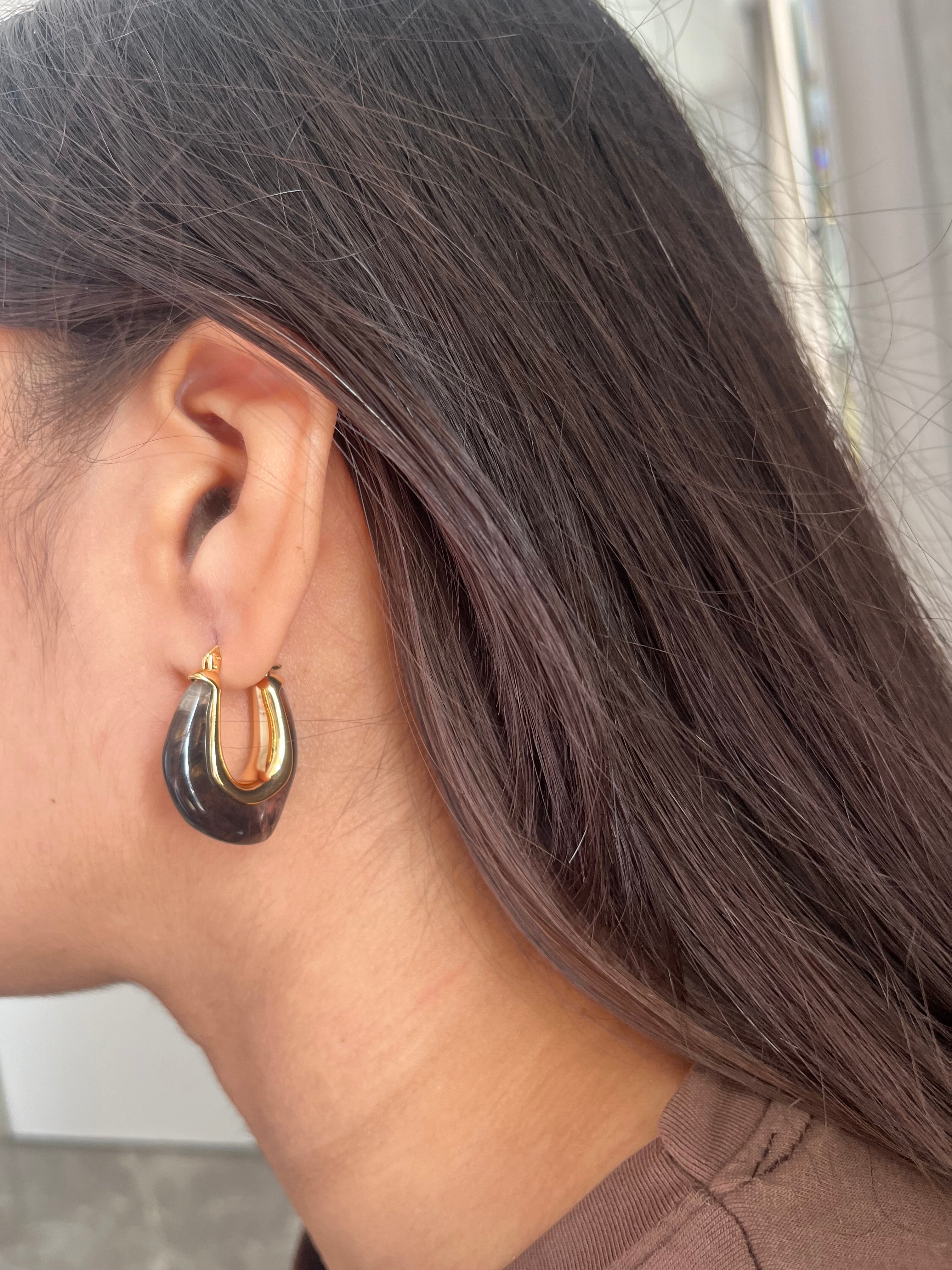 Aura Curve – Noir Gold